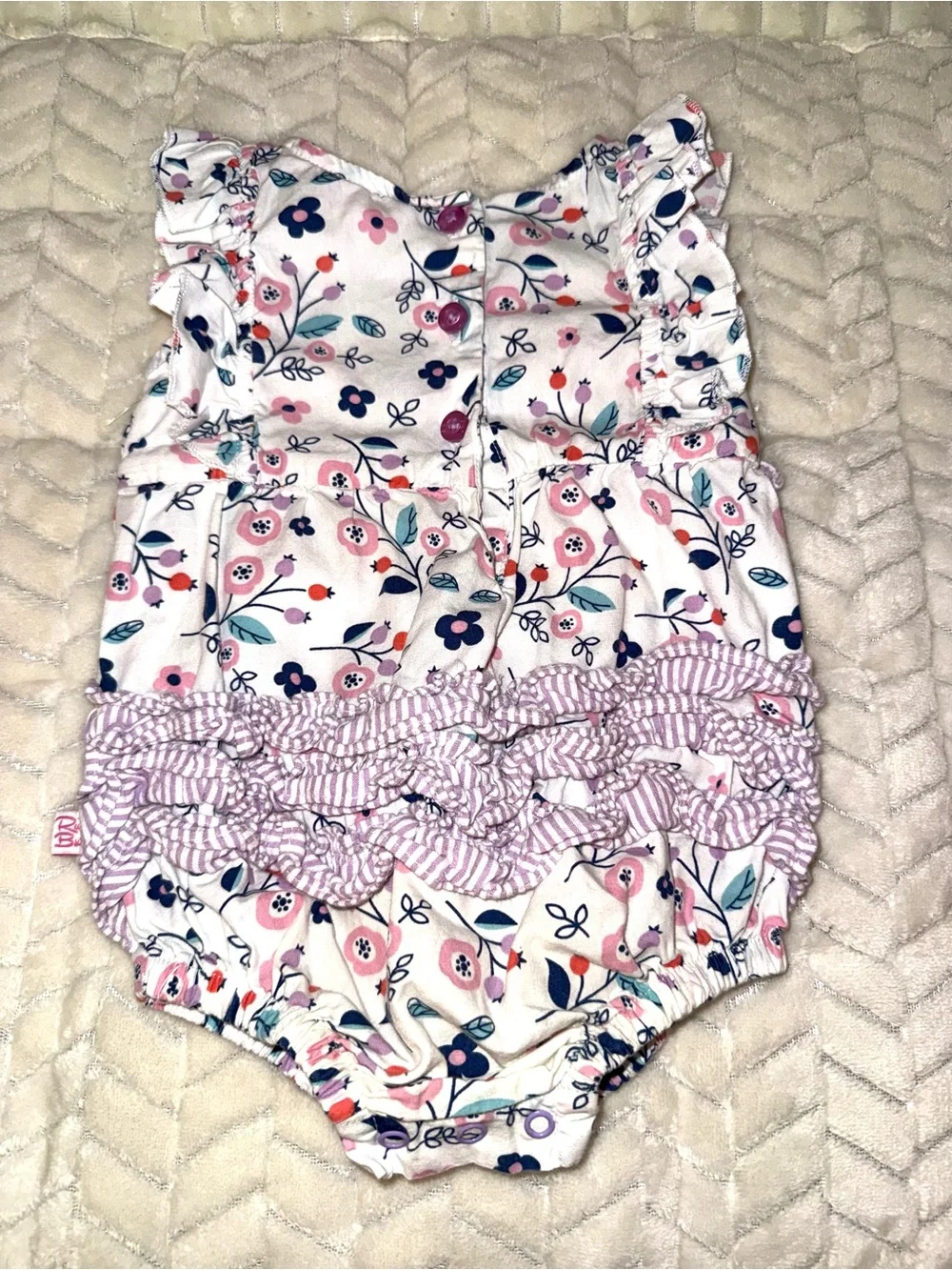 Ruffle Butts floral patterned white baby romper, size 6-12 mos